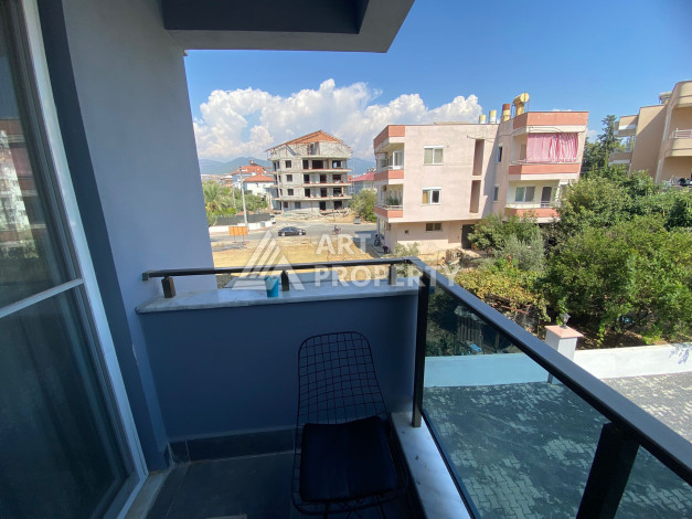 Квартира с шикарной террасой и видом на город и море в районе Махмутлар планировки 2+1, 110м2 - Ракурс 13