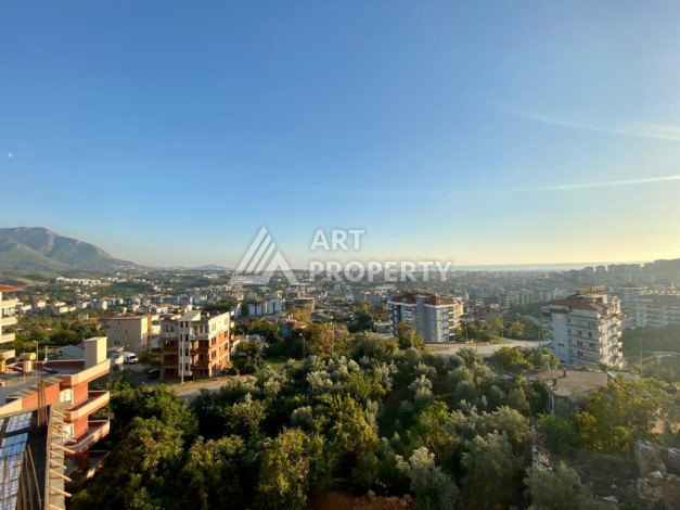 Квартира с панорамными окнами и видом на город и море в районе Оба планировки 3+1, 150м2 - Ракурс 2