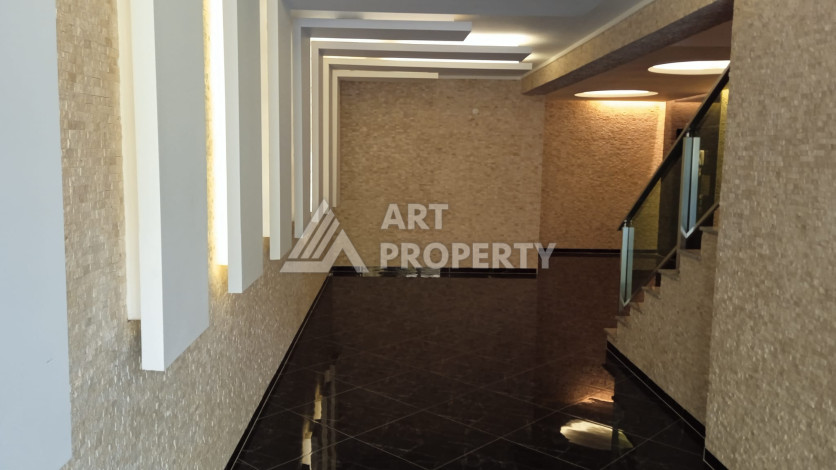 Апартаменты планировки 4+1 общей площади 215 м2 в Алании - Ракурс 37