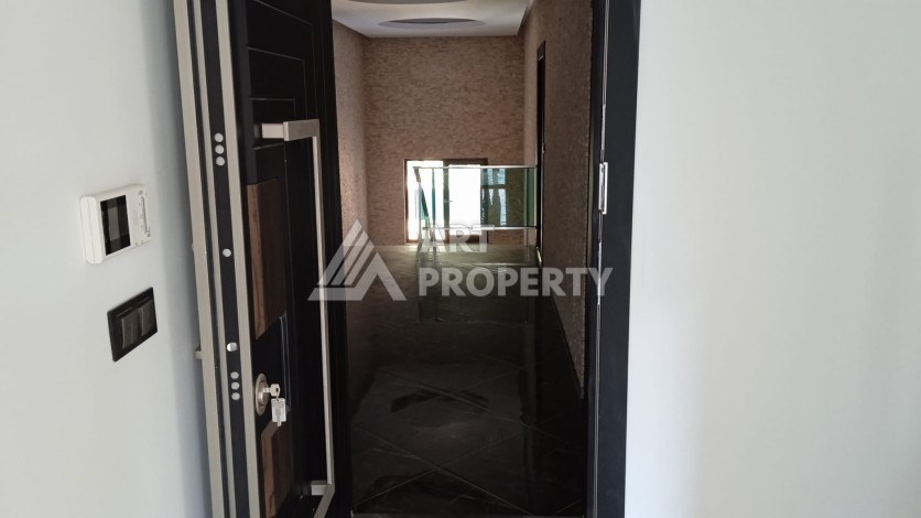 Апартаменты планировки 4+1 общей площади 215 м2 в Алании - Ракурс 45