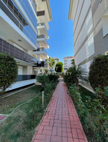 Квартира 1+1, 65м2, всего в 50 метрах от моря, в районе Кестель. - Ракурс 6