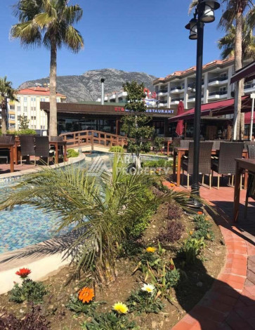 Квартира 1+1, 65м2, всего в 50 метрах от моря, в районе Кестель. - Ракурс 8