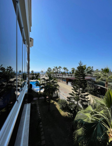 Квартира 1+1, 65м2, всего в 50 метрах от моря, в районе Кестель. - Ракурс 10