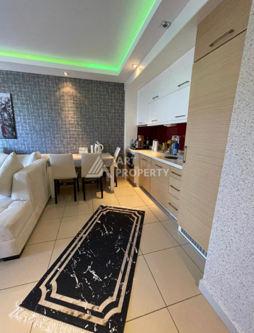 Квартира 1+1, 65м2, всего в 50 метрах от моря, в районе Кестель. - Ракурс 15