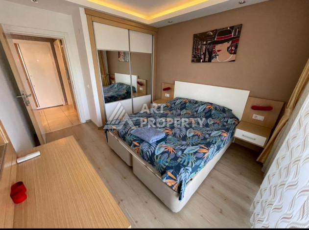 Квартира 1+1, 65м2, всего в 50 метрах от моря, в районе Кестель. - Ракурс 21