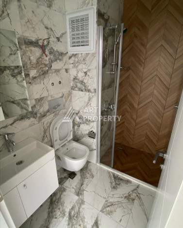 1+1, в новом доме, в районе Кестель, всего в 200 метрах от моря. - Ракурс 8