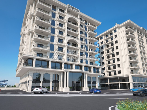 Комплекс на этапе строительства от ведущего застройщика Алании в районе Махмутлар! - Ракурс 6