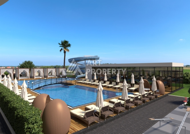 Комплекс на этапе строительства от ведущего застройщика Алании в районе Махмутлар! - Ракурс 7