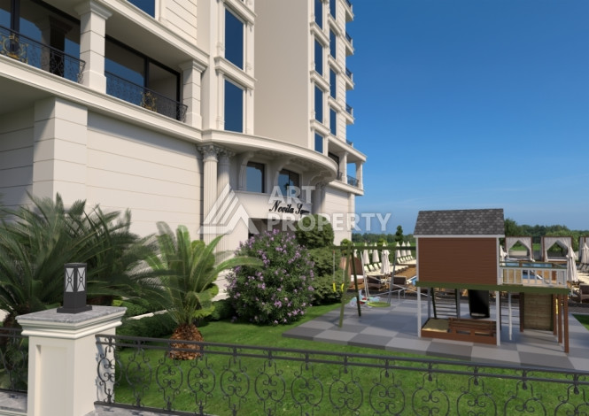 Комплекс на этапе строительства от ведущего застройщика Алании в районе Махмутлар! - Ракурс 8