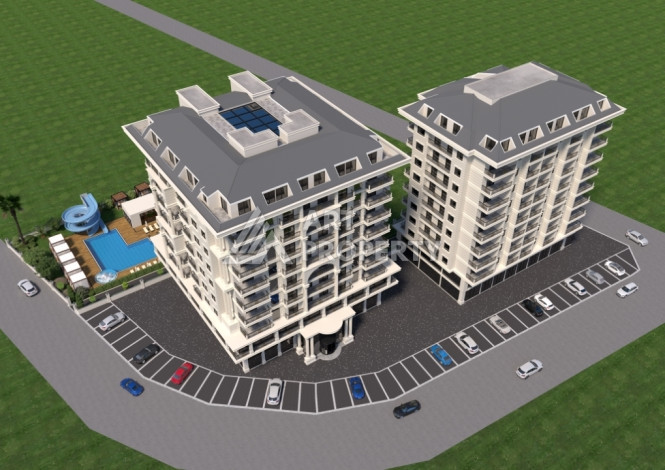 Комплекс на этапе строительства от ведущего застройщика Алании в районе Махмутлар! - Ракурс 10