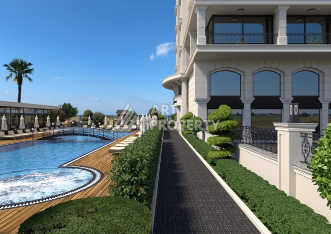 Комплекс на этапе строительства от ведущего застройщика Алании в районе Махмутлар! - Ракурс 12