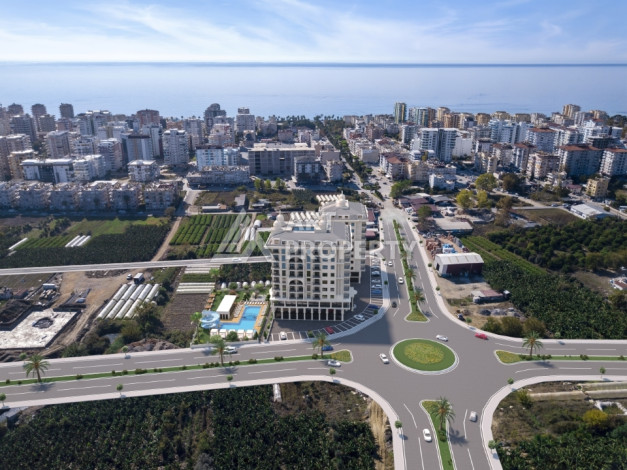 Комплекс на этапе строительства от ведущего застройщика Алании в районе Махмутлар! - Ракурс 15