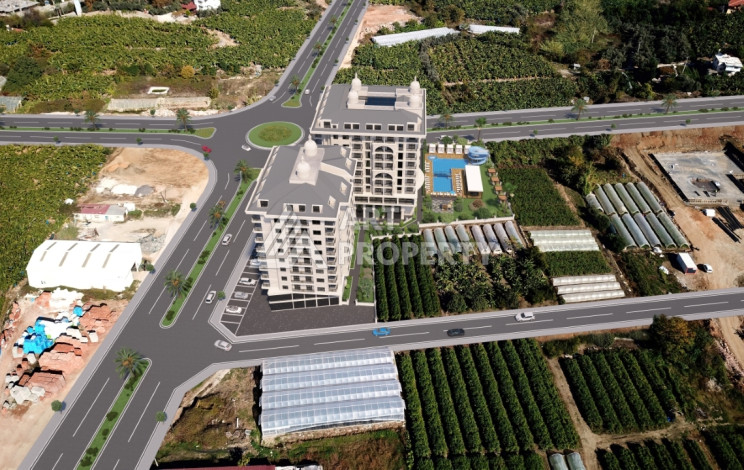 Комплекс на этапе строительства от ведущего застройщика Алании в районе Махмутлар! - Ракурс 16