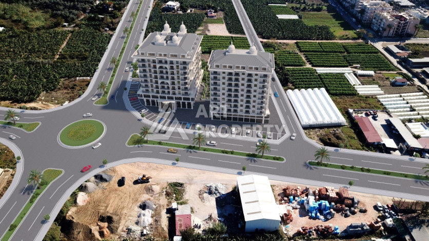 Комплекс на этапе строительства от ведущего застройщика Алании в районе Махмутлар! - Ракурс 17