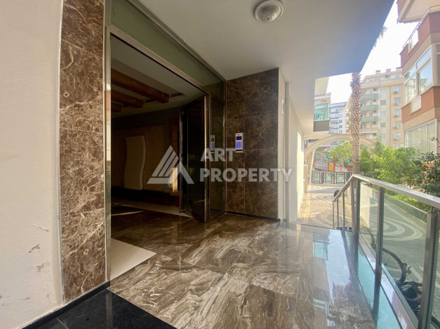 Квартира 1+1 в районе Махмутлар, всего в 200 метрах от моря - Ракурс 4