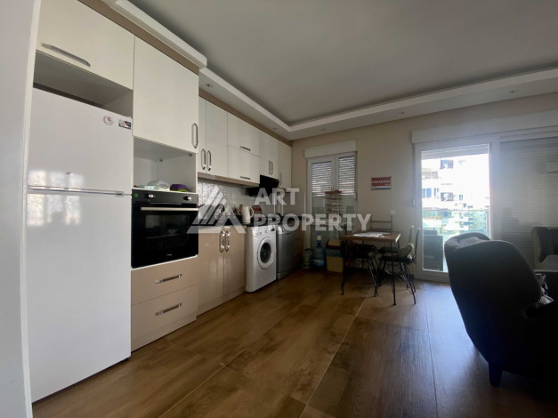 Квартира 1+1 в районе Махмутлар, всего в 200 метрах от моря - Ракурс 7