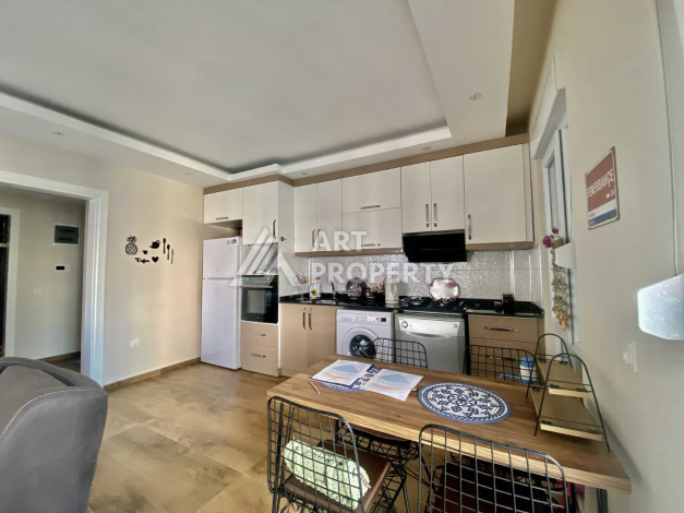 Квартира 1+1 в районе Махмутлар, всего в 200 метрах от моря - Ракурс 8