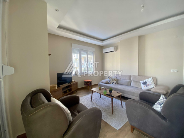 Квартира 1+1 в районе Махмутлар, всего в 200 метрах от моря - Ракурс 9