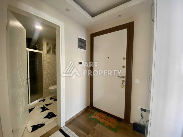 Квартира 1+1 в районе Махмутлар, всего в 200 метрах от моря - Ракурс 15