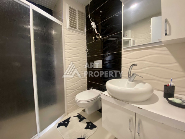 Квартира 1+1 в районе Махмутлар, всего в 200 метрах от моря - Ракурс 16