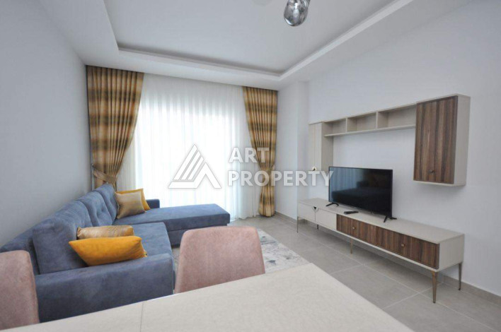 Апартаменты в жилом комплексе с прекрасной инфраструктурой в районе Махмутлар планировки 1+1, 47м2 - Ракурс 9