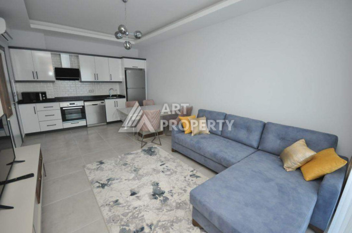 Апартаменты в жилом комплексе с прекрасной инфраструктурой в районе Махмутлар планировки 1+1, 47м2 - Ракурс 6