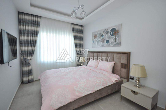 Апартаменты в жилом комплексе с прекрасной инфраструктурой в районе Махмутлар планировки 1+1, 47м2 - Ракурс 12