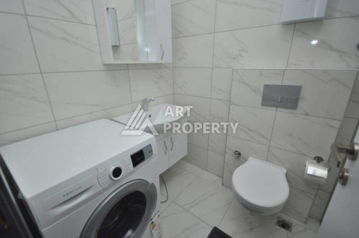 Апартаменты в жилом комплексе с прекрасной инфраструктурой в районе Махмутлар планировки 1+1, 47м2 - Ракурс 16