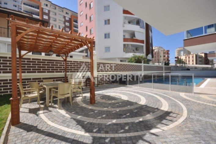 Меблированные апартаменты планировки 1+1 в районе Махмутлар, 47м2 - Ракурс 18