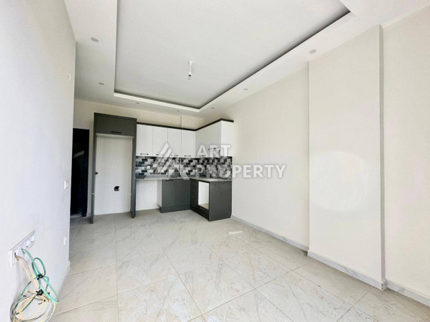 Апартаменты в новом доме планировки 1+1 в престижном районе Оба, 48м2 - Ракурс 3