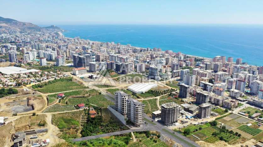 Новый инвестиционный проект в районе Махмутлар - Ракурс 9