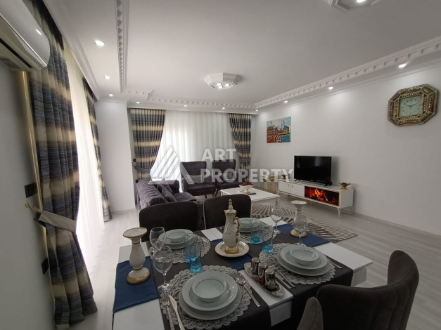 Меблированные апартаменты в Махмутларе планировки 2+1, 120м2 - Ракурс 18