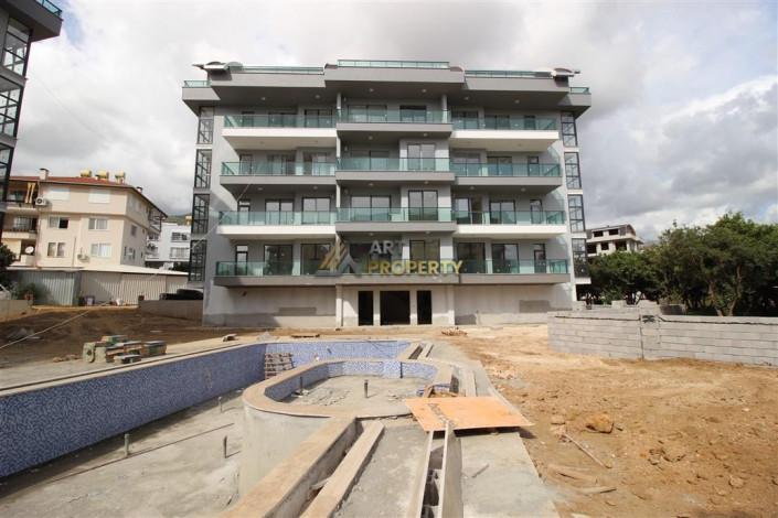 Квартира 1+1 в доме с инфраструктурой в престижном районе Оба, 50м2 - Ракурс 2