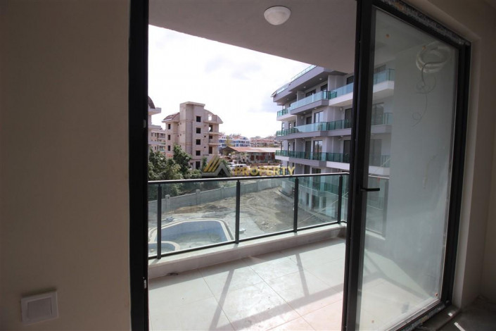 Квартира 1+1 в доме с инфраструктурой в престижном районе Оба, 50м2 - Ракурс 12