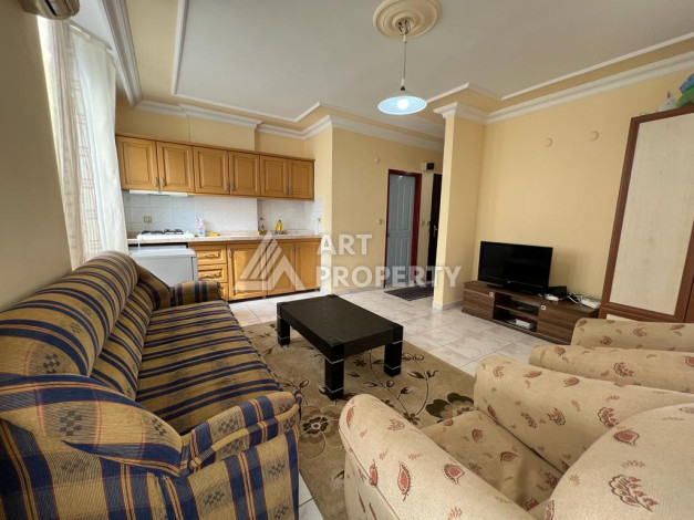 Апартаменты планировки 1+1 в районе Махмутлар, 50м2 - Ракурс 4