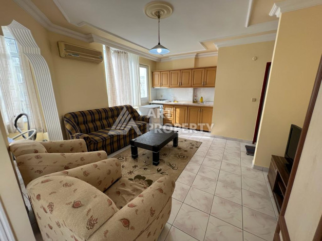 Апартаменты планировки 1+1 в районе Махмутлар, 50м2 - Ракурс 6