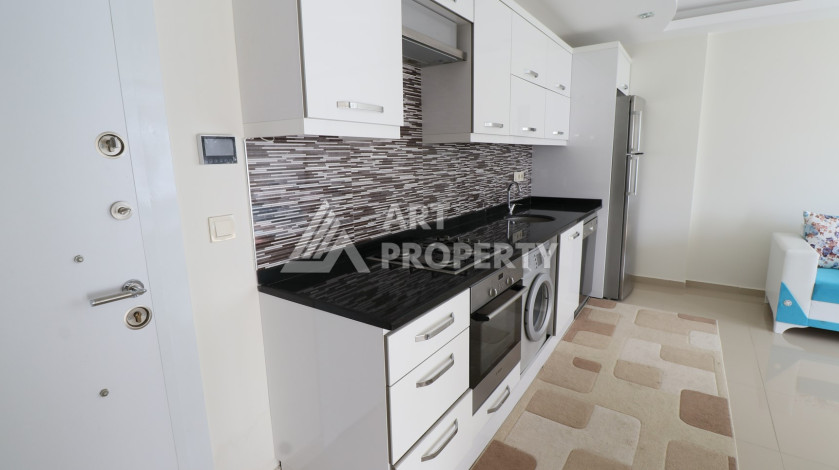 Квартира 1+1 в районе Махмутлар, всего в 300 метрах от моря - Ракурс 2