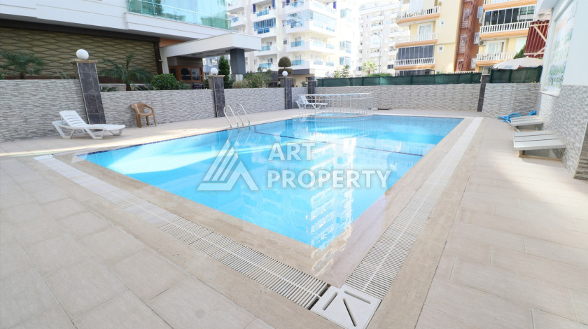 Квартира 1+1 в районе Махмутлар, всего в 300 метрах от моря - Ракурс 9