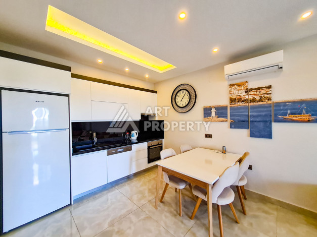 Меблированные апартаменты в комплексе с богатой инфраструктурой в районе Махмутлар, 65м2 - Ракурс 3