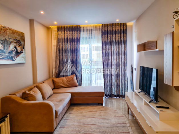 Меблированные апартаменты в комплексе с богатой инфраструктурой в районе Махмутлар, 65м2 - Ракурс 12