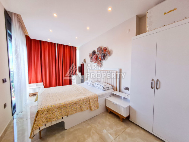 Меблированные апартаменты в комплексе с богатой инфраструктурой в районе Махмутлар, 65м2 - Ракурс 14