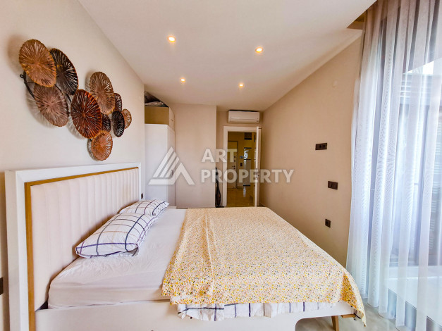 Меблированные апартаменты в комплексе с богатой инфраструктурой в районе Махмутлар, 65м2 - Ракурс 15