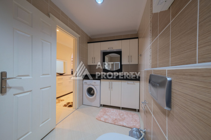 Меблированные апартаменты в 50-ти метрах от пляжа Клеопатры планировки 2+1, 140м2 - Ракурс 24