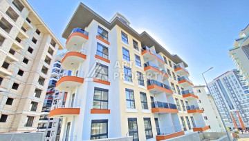 Двухуровневые апартаменты в новом жилом комплексе планировки 2+1 в районе Махмутлар, 120м2 - Ракурс 1