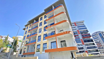 Двухуровневые апартаменты в новом жилом комплексе планировки 2+1 в районе Махмутлар, 120м2 - Ракурс 2
