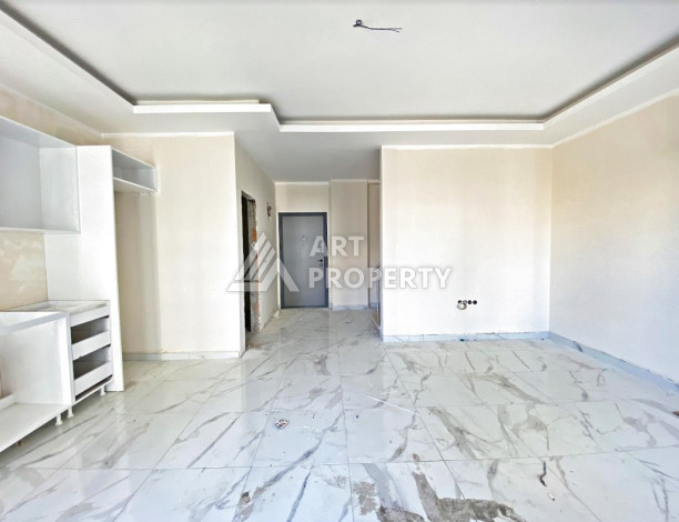 Двухуровневые апартаменты в новом жилом комплексе планировки 2+1 в районе Махмутлар, 120м2 - Ракурс 11