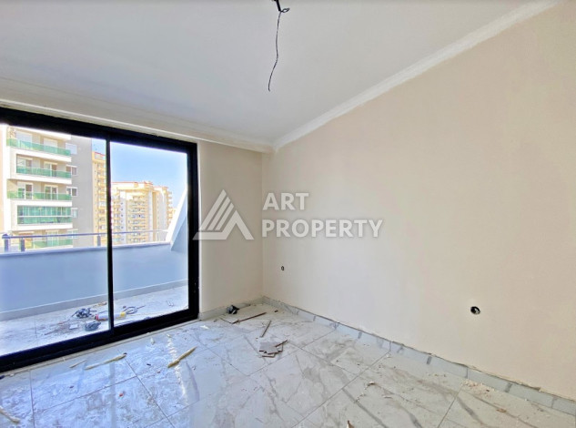 Двухуровневые апартаменты в новом жилом комплексе планировки 2+1 в районе Махмутлар, 120м2 - Ракурс 24