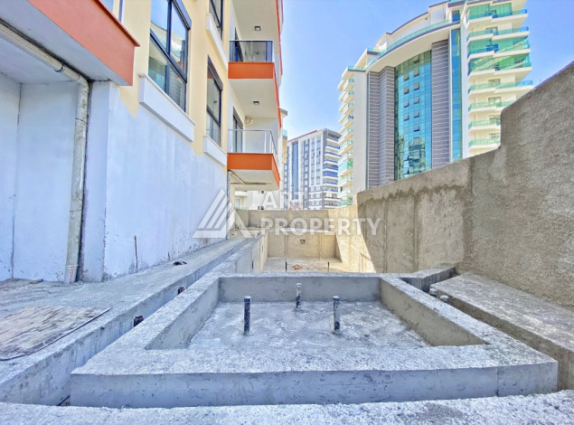 Двухуровневые апартаменты в новом жилом комплексе планировки 2+1 в районе Махмутлар, 120м2 - Ракурс 26