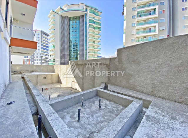 Двухуровневые апартаменты в новом жилом комплексе планировки 2+1 в районе Махмутлар, 120м2 - Ракурс 27