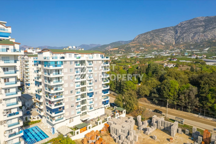 Стильная квартира в жилом комплексе с развитой инфраструктурой в районе Махмутлар, планировки 2+1, 115м2 - Ракурс 23